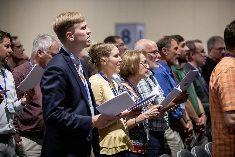 People singing in worship (1) (1)